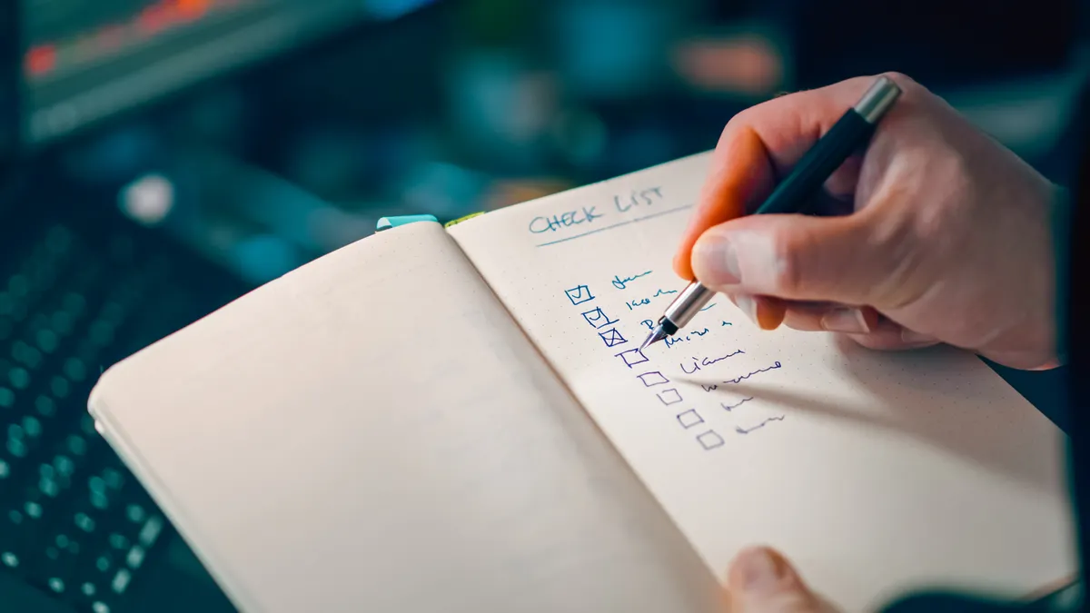 Review checklist for writing automation tools before you buy — Writing in Notebook with Checklist for Task Management